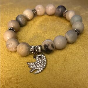 Elegant Beaded Bracelet with Silver Crystal Bird charm.